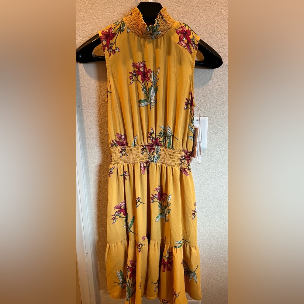 Nanette Lepore: Midi Floral Dress in size 4. Brand New with tag.